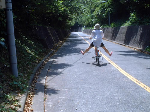 shikinejima kumi riding bicycle
